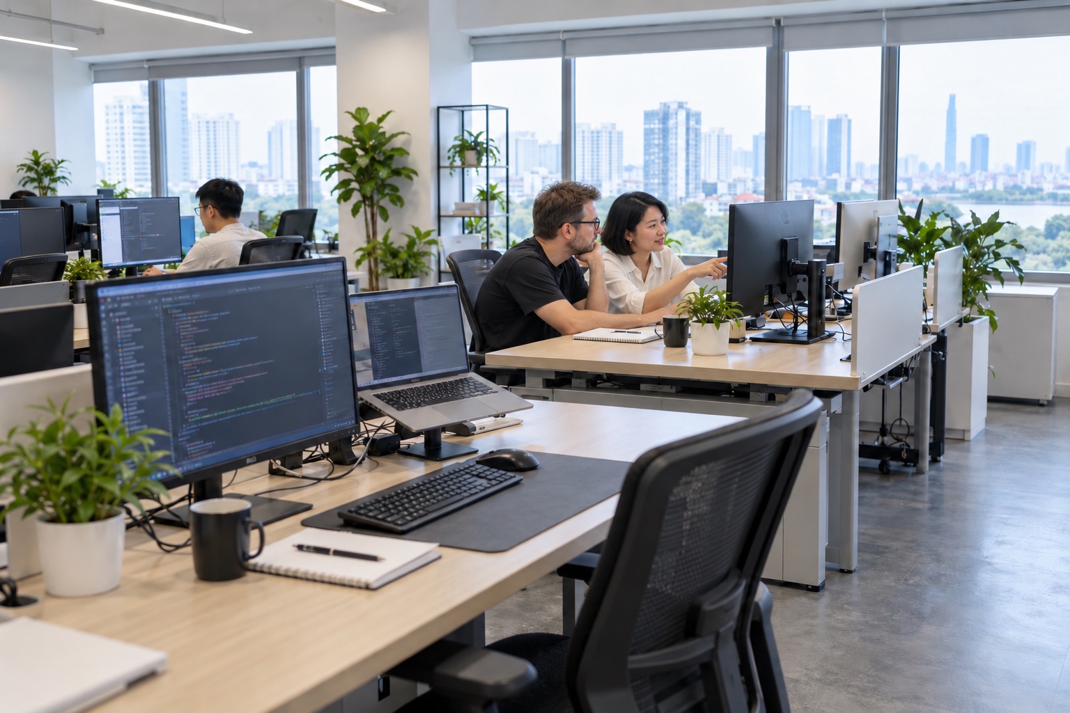 A bright office with computer workstations.